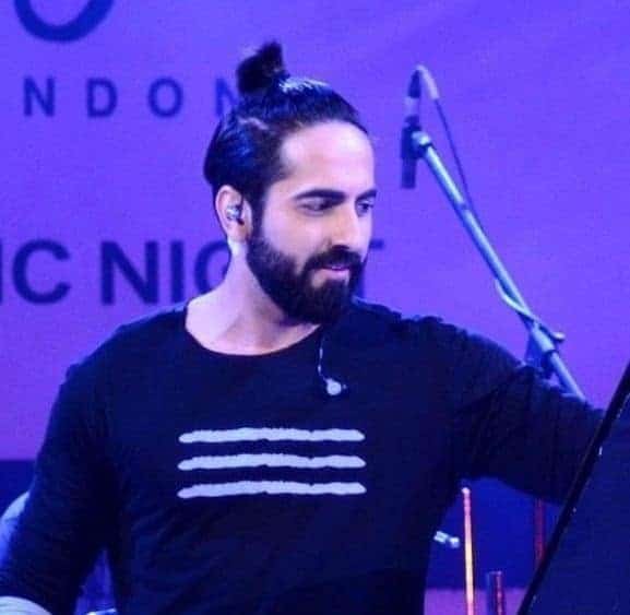 A picture of an Indian guy with a long bro bun hairstyle  Man Bun Hairstyle